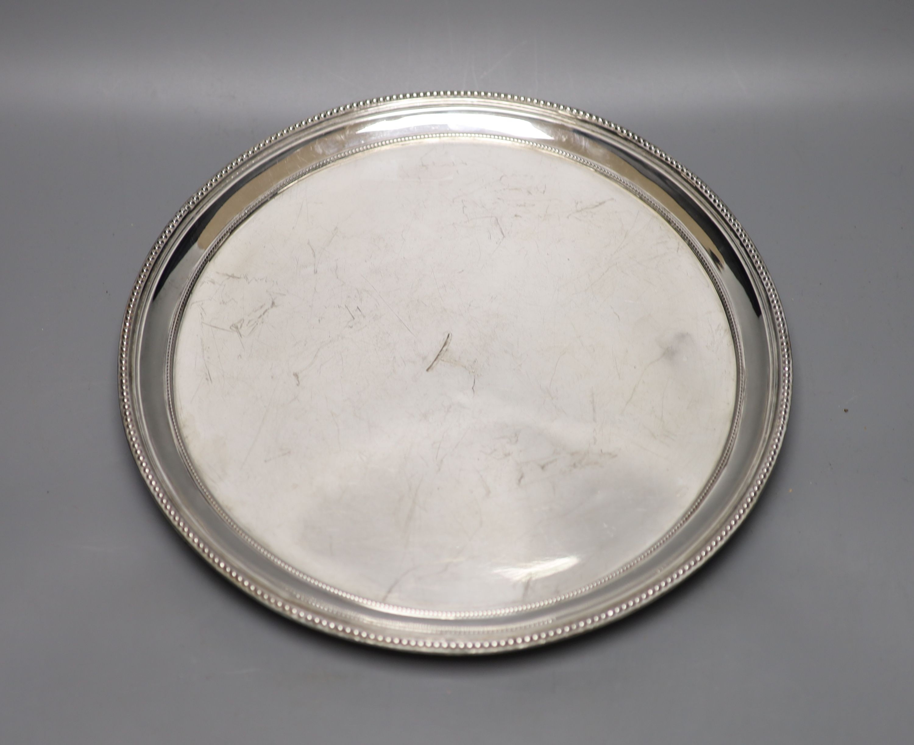 A George III silver circular salver by William Turton, London, 1782, 30.2cm, 26.5 oz.